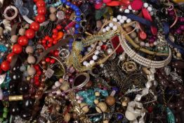 Two large bags of mixed jewellery including bangles, necklaces etc