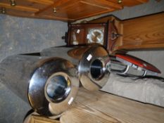 Two towers for CD and DVD storage, step stool, two chrome linen bins and a reproduction wall clock