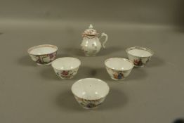 A Chinese cream jug and five tea bowls, variously decorated