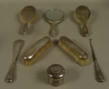 A four piece silver and tortoiseshell backed dressing table set, Birmingham 1920, comprising, hand