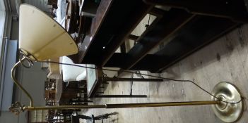 A gilt metal reading lamp