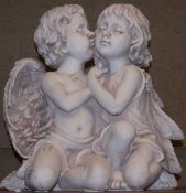 A reproduction composition figure group of two cherubs