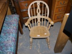 A child's beech rocking chair