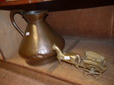 A four gallon copper measure, together with a modern brass horse and cart ornament