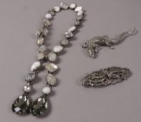 A silver marcasite set dress clip/brooch c.1940 with nickel frame, together with a silver