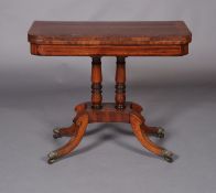A late regency mahogany and rosewood crossbanded card table, with yew-wood banding, the