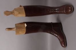 A pair of gentleman's brown leather military riding boots complete with trees