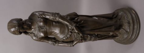 A reproduction figure of a Renaissance lady on circular base