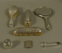 A George V three piece silver backed dressing table set, Birmingham 1925, together with a silver