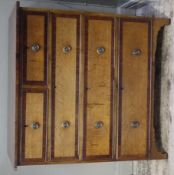 An 19th century oak and mahogany banded chest of two short and three long graduated drawers with