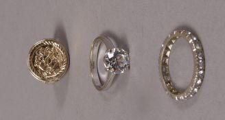 A single stone ring in 18ct white gold set with brilliant cut cubic zirconia, approximate weight