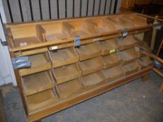 A haberdashers counter with four tier waterfall drawers, glass surface missing