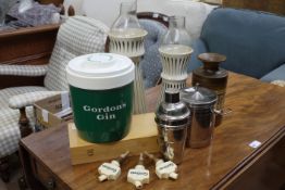 A travelling chess set together with a Gordon's gin ice bucket, stainless steel ice bucket, cocktail