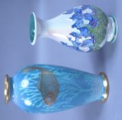 A Moorland hand painted vase, tube lined with iris on a mother of pearl lustre ground, signed LB