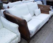 A Barker & Stonehouse fruitwood and bergere caned drop end sofa upholstered in oatmeal linen on