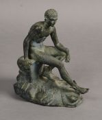 An early 20th century Italian bronze figure of mercury, nude, wings at his heels, sitting upon a