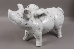 A pottery pig with wings
