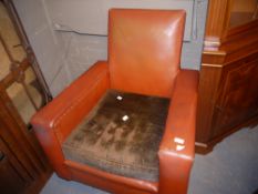 A 1920s/30s leather club chair with close nail detail