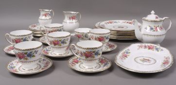 A Royal Grafton Malvern tea and dinner service, comprising teapot, cups, saucers, tea plates