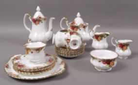 A Royal Albert Old Country Roses tea and coffee service comprising teapot, coffee pot, cream and