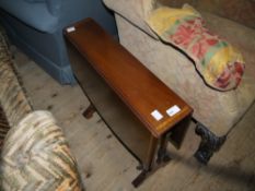 A reproduction mahogany and satinwood banded Sutherland table