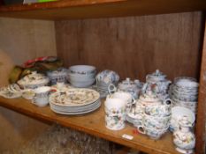 Chinese dinner service comprising, plates, bowls, serving tureens, rice dishes, teapots etc