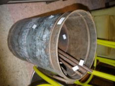 A reproduction steel bin with loop handles containing a selection of ladles and another small bin