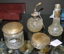 A silver lidded cut glass toilet jar, Birmingham 1922, together with a sterling silver mounted cut