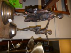 A pair of reproduction Art Nouveau figures in the manner of Chiparus, figures in dancing poses on