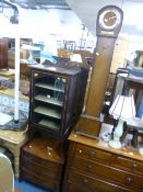 A SMALL EDWARDIAN GLAZED CABINET, a walnut chest of three drawers and an oak cased grandmother clock