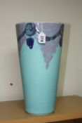 A LARGE POOLE POTTERY TAPERED VASE, blue and purple abstract design on turquoise ground, height