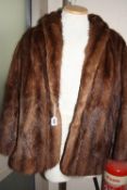 A FUR JACKET, 'Faulkes, Edgbaston' label