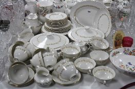 A ROYAL DOULTON 'FAIRFAX' PATTERN DINNER SERVICE, (over 55 pieces)