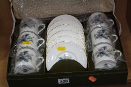 SIX BOXED ROYAL WORCESTER COFFEE CUPS AND SAUCERS