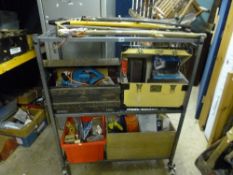 A FOLDING METAL THREE TIER TROLLEY
