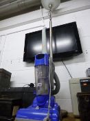 AN UPRIGHT VACUUM CLEANER, and a chrome uplighter (2)