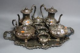 A 20TH CENTURY TWIN HANDLED SILVER PLATED TRAY, and eight EPNS tea set items (9)