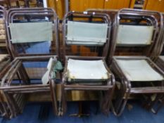 THIRTEEN TUBULAR METAL STACKING CHAIRS, with canvas seats and backrests and six various oak framed
