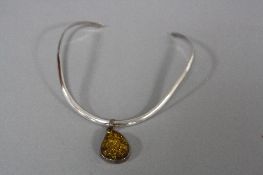 A SILVER AND AMBER NECKLACE