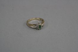 A 9CT EMERALD AND DIAMOND RING, ring size N