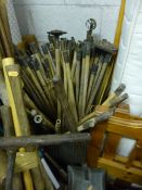 A GALVANISED DOLLY TUB, and a quantity of drain rods