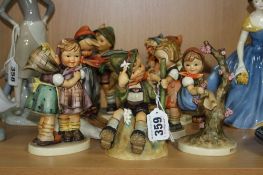 SEVEN LARGE HUMMEL FIGURES, to include 'Mountaineer' HUM315, 'Telling Her Secret' HUM196, 'Apple