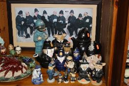 A GROUP OF POLICE THEMED NOVELTY TEAPOTS, FIGURES, PRINT, etc (19)
