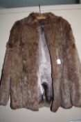 A CONEY FUR JACKET, size 16