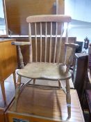 A SPINDLE BACK KITCHEN ARMCHAIR