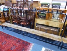 A PAINTED TUBULAR METAL SCHOOL CLOAKROOM EIGHTEEN HOOK COAT RACK, each hook numbered with wooden