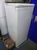 A TALL FRIGIDAIRE FRIDGE