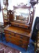 AN ART NOUVEAU STYLE WALNUT TRIPLE MIRROR DRESSING TABLE