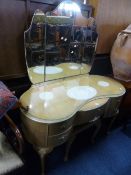 A BLEACHED WALNUT DRESSING TABLE, with triple mirror and a stool (key) (2)