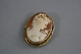 A 9CT CAMEO BROOCH